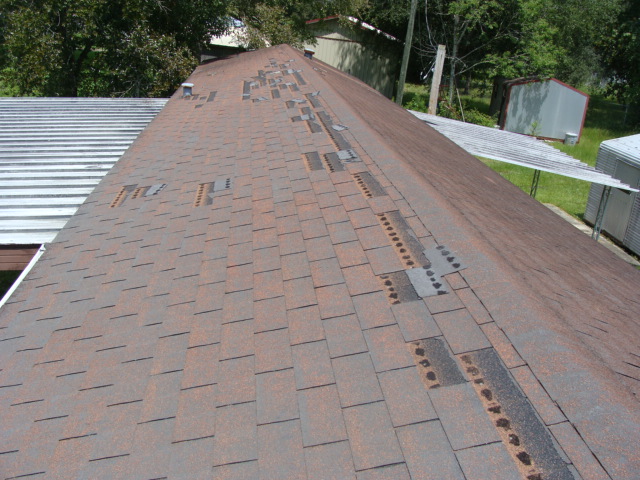 Shingles on roof torn and missing - reduced efficiency and near end of life on roof.